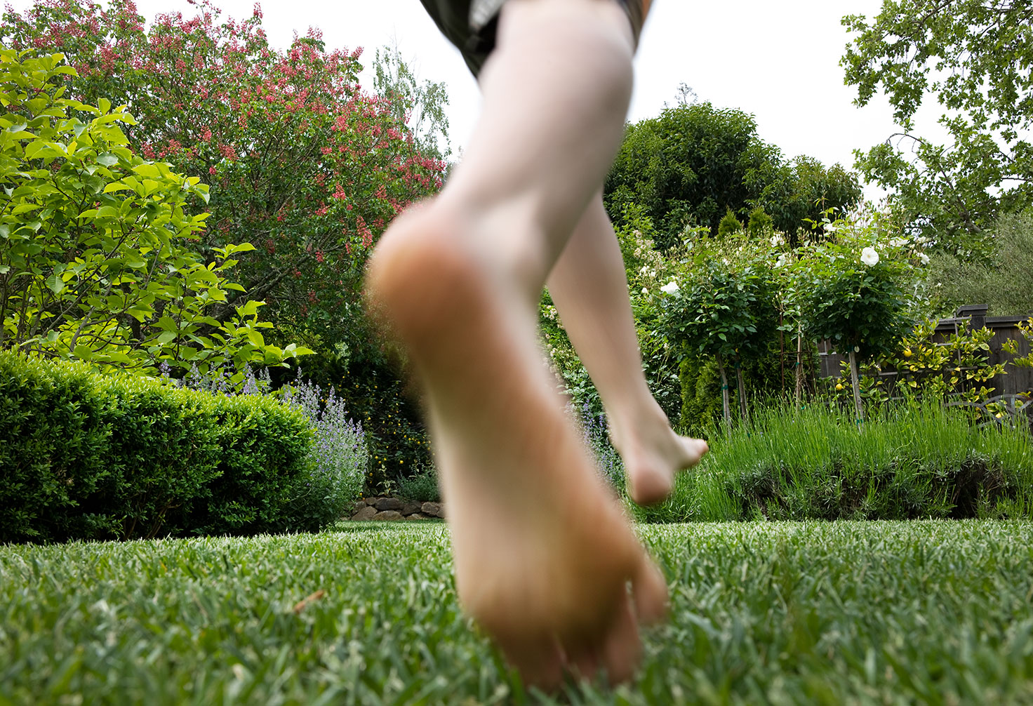 boy-running-in-garden